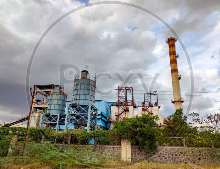 Metallurgical plant with pipes, environmental pollution. Industrial landscape
