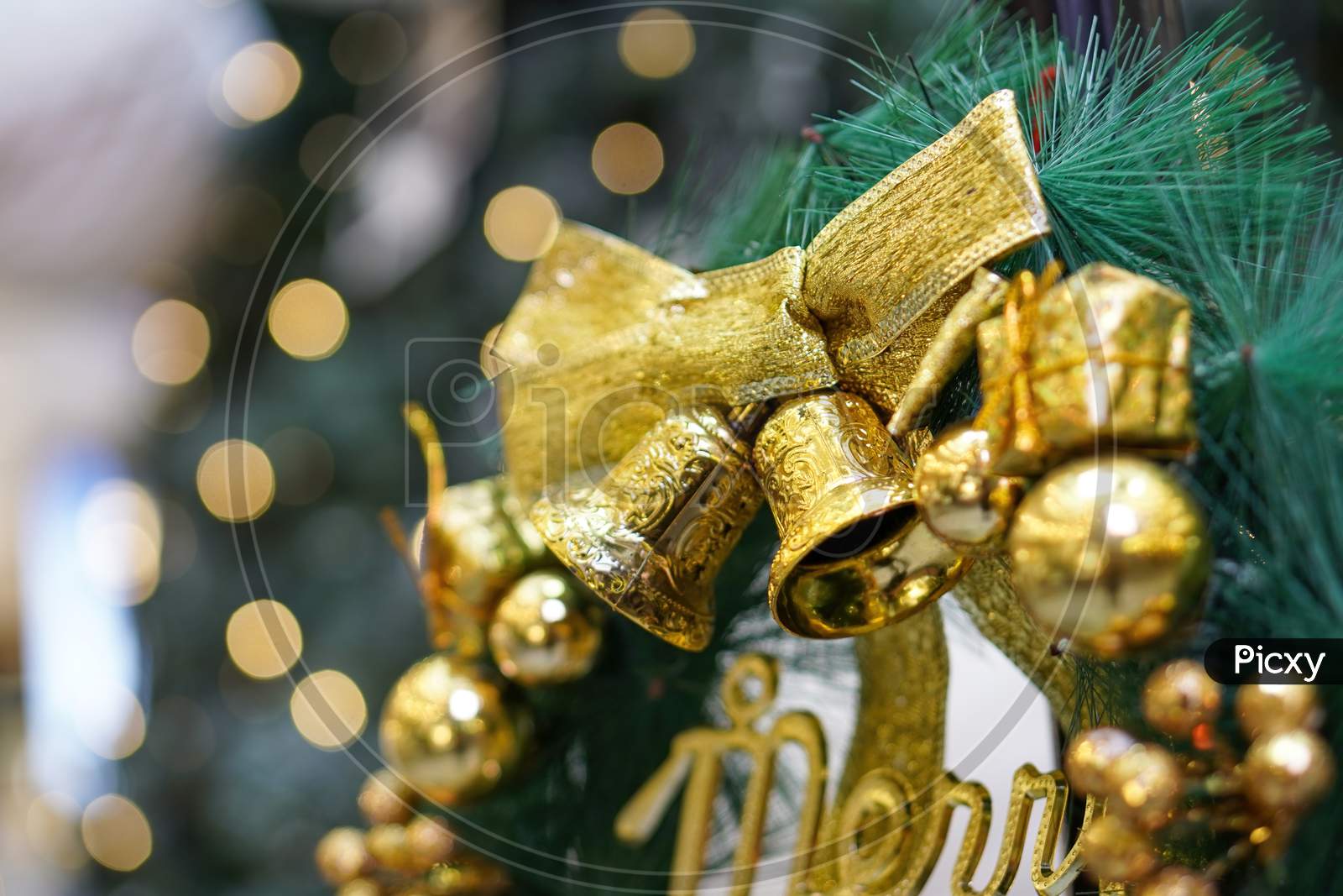 Close Up Gold Christmas Bell Ornament