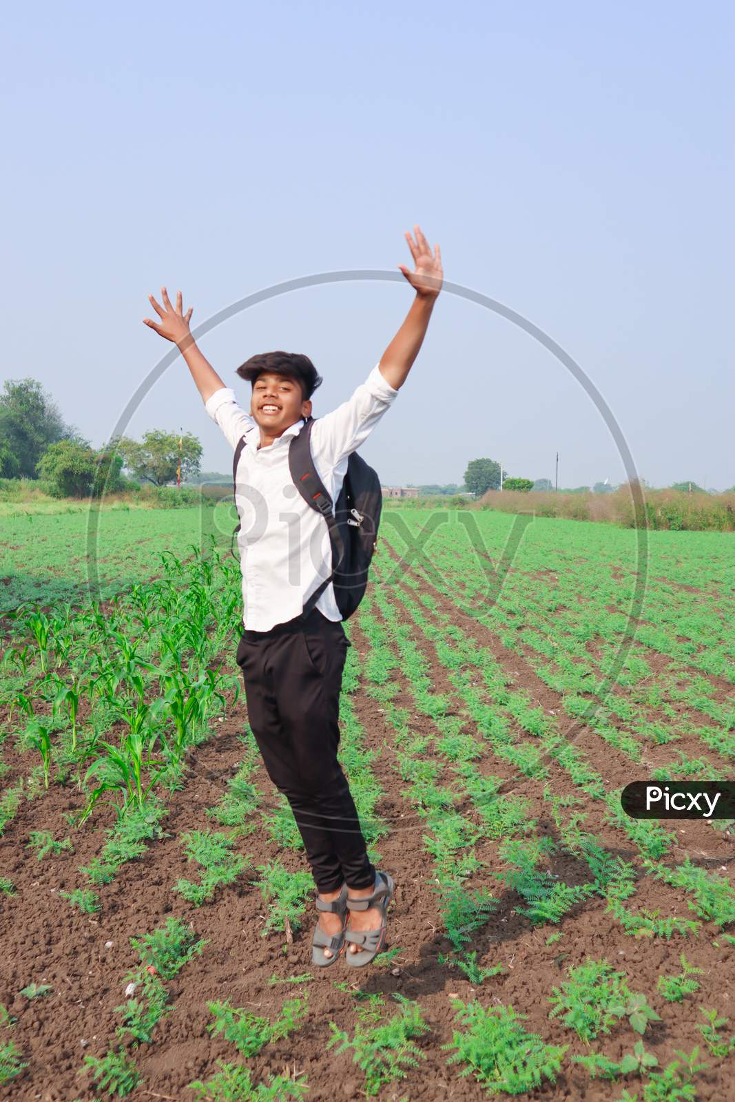 Happy Indian Child Jumping In Air