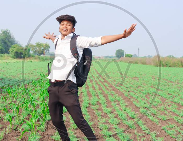 Happy Indian Child Jumping In Air