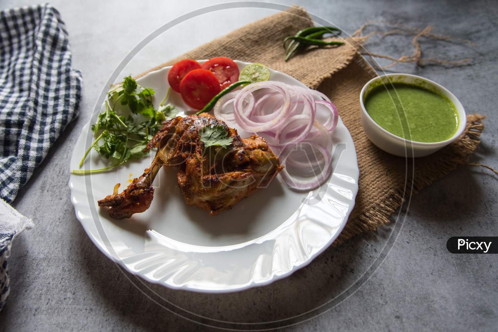 Close up of delicious chicken tandoori in a plate