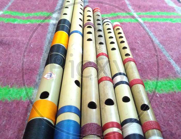 6 bamboo flutes also called Indian Bansuri of different scales in one picture fram