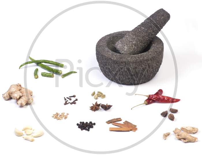 Stone Mortar And Pestle With Herbs