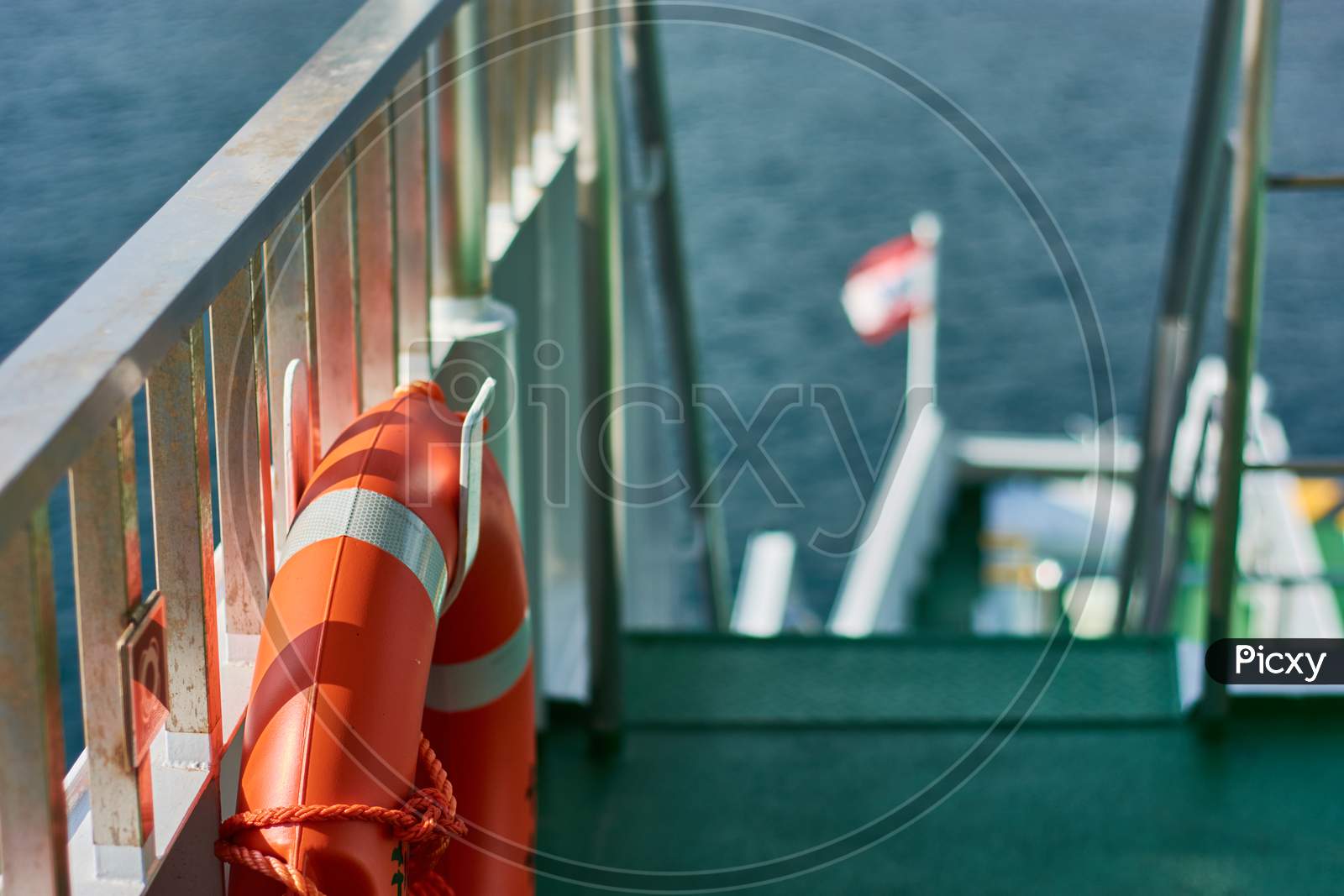 Closeup Shot Of A Lifebuoy On A Dock By The Sea