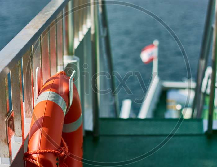 Closeup Shot Of A Lifebuoy On A Dock By The Sea