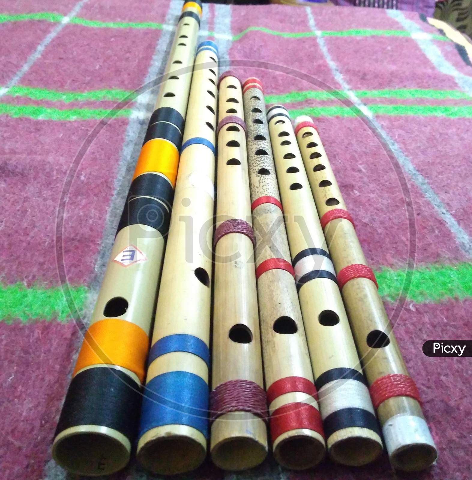 6 bamboo flutes also called Indian Bansuri of different scales in one picture fram
