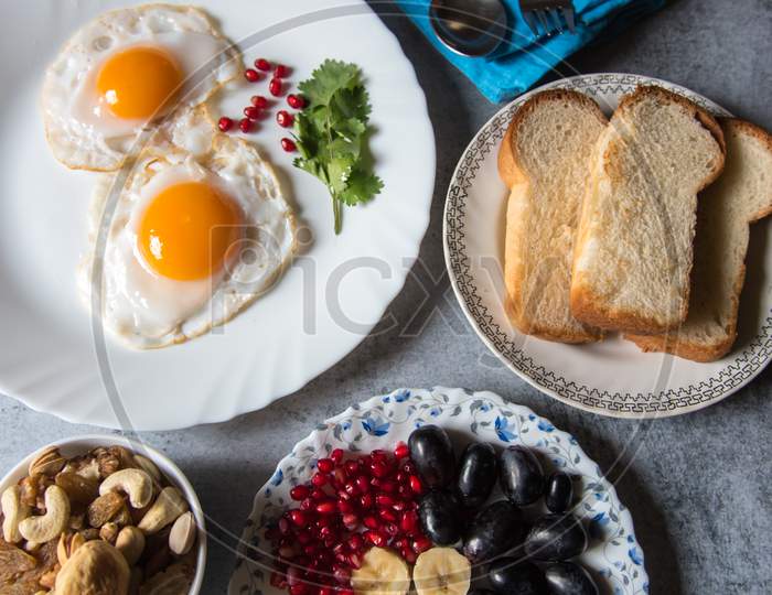 Healthy breakfast food ingredients on a background.