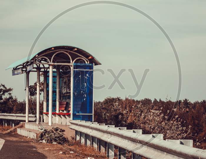 View Of Bus Stop With Shelter From Sun Along East Coast Road, Chennai, India. Selective Focus
