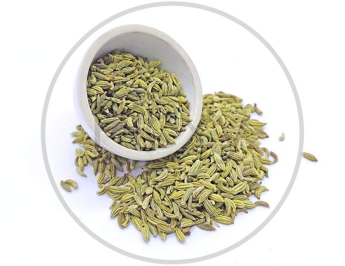Dried Fennel Seeds Pouring From A Bowl