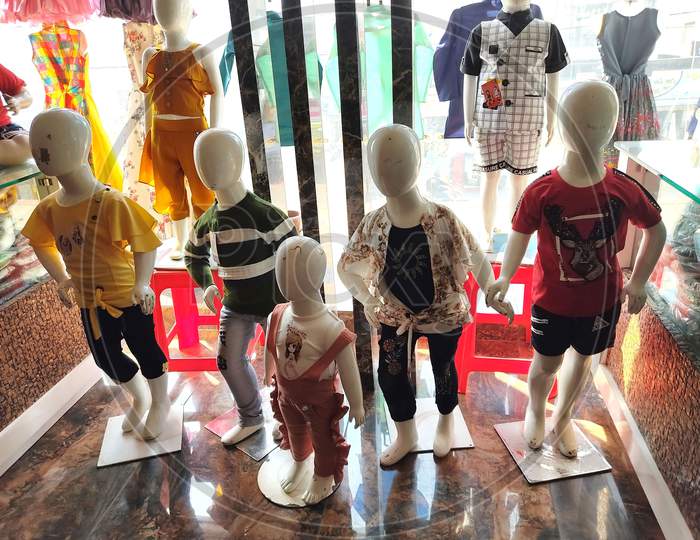 Childrens Mannequins In A Shop, Display Of A Clothing Store