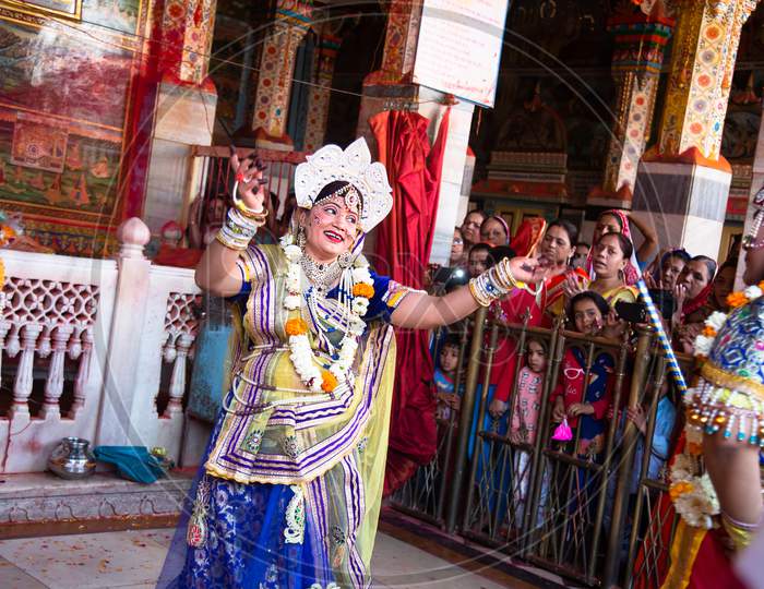 Jodhpur, Rajastha, India - March 20, 2020: People Performing Lord Krishna And And Gopi Sattriya Dance, Happy Janmashtami Festival Concept Background, Playing Holi.