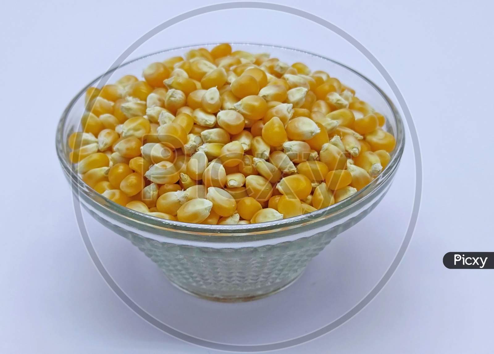 Corn Kernels, Corns Seeds, Yellow Dry Corn Grains In Bowl On White Background