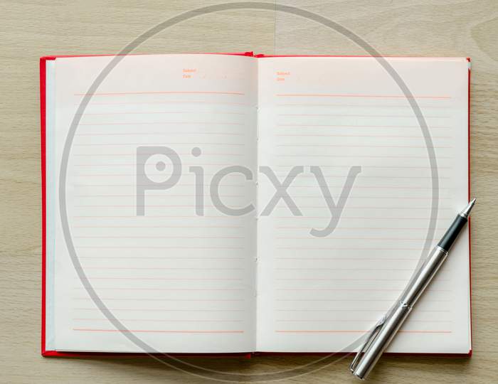 Blank Notebook With Pen On Wood Table Text Input Area