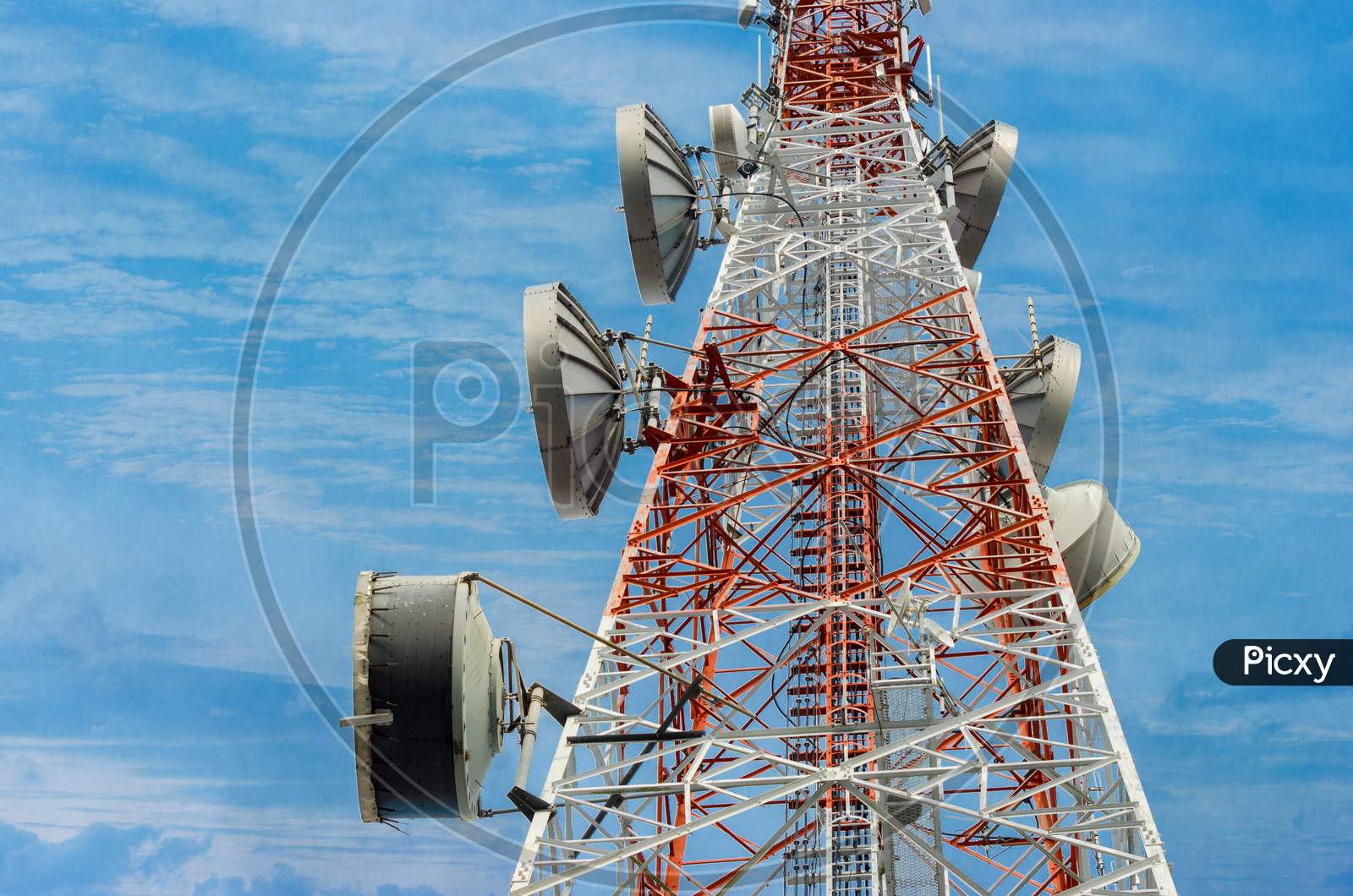 Telecommunication Tower Antenna In The Clear Sky