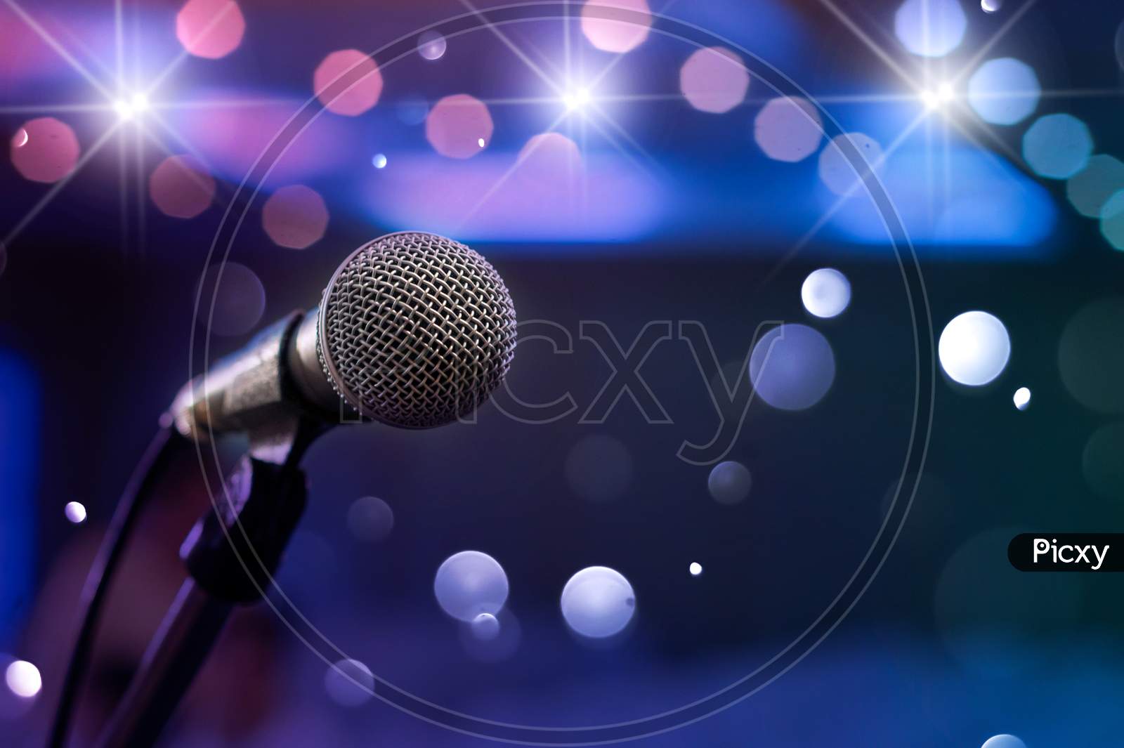 Communication Microphone On Stage Against A Background Of Auditorium Concert Stage
