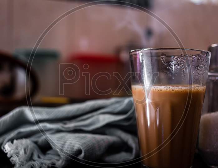 Fresh Hot Tea In A Glass Tumbler In A Home Kitchen. Hot Beverage In A Glass. Selective Focus