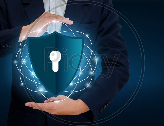 Businessmen Shake Hands To Protect Information In Cyberspace. Businessman Holding Shield Protect Icon Protection Network Security Computer And Safe Your Data Concept, Space Input Data