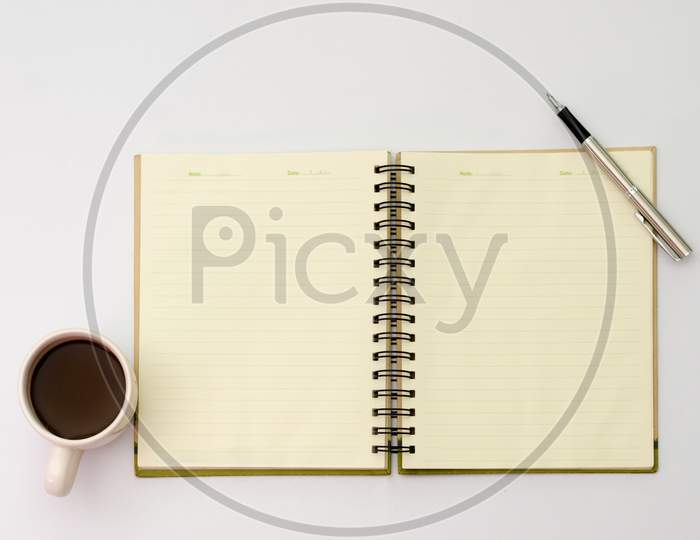 Space On The Desk  Area Space Enter Text. Mockup Coffee Cups Snack Candy,  Pen Note Paper Placed On A White Table Top View Desk Table With A Lot Of Things On It Top View With Copy Space