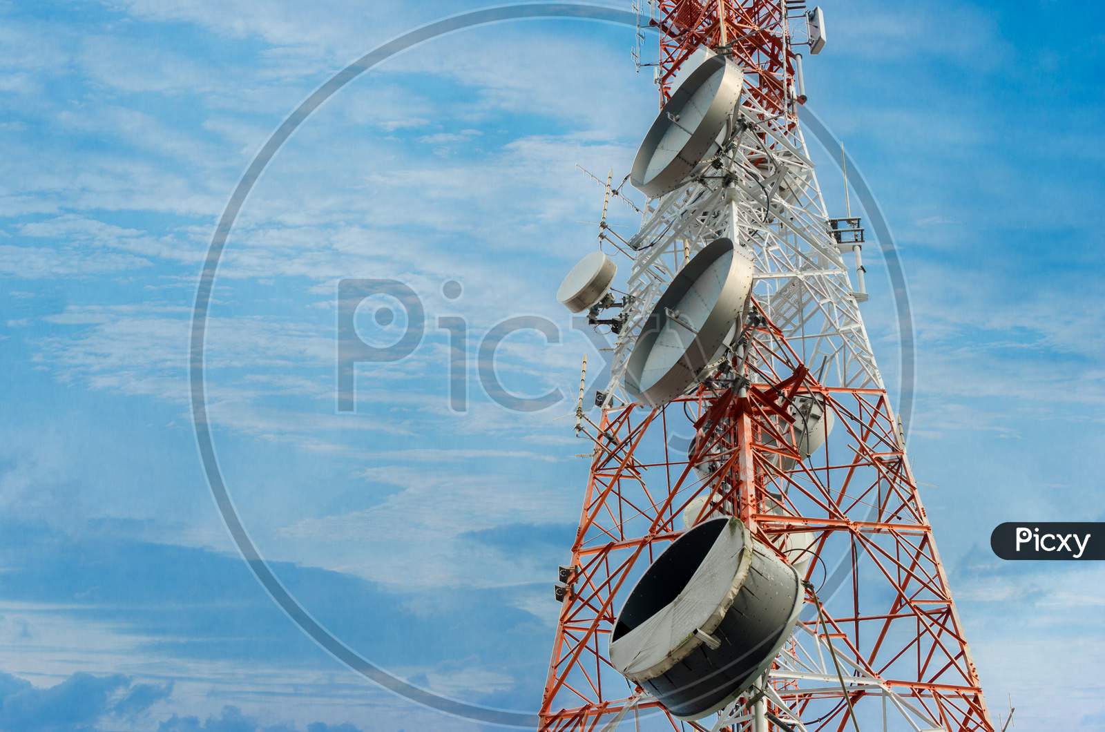 Telecommunication Tower Antenna In The Clear Sky