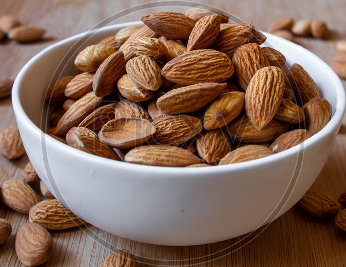 View Of Almonds In A Bowl. Use For Healthy Snack Concept.