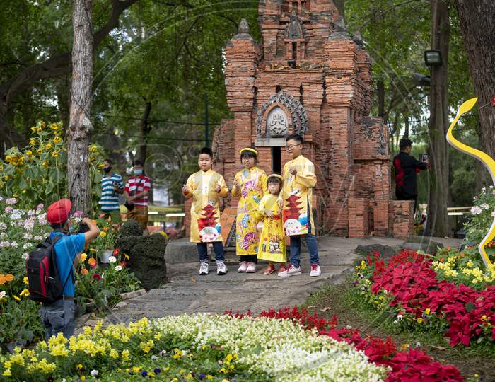 Vietnamese people and tourists were in Tao Dan park happily to enjoy the atmosphere of spring