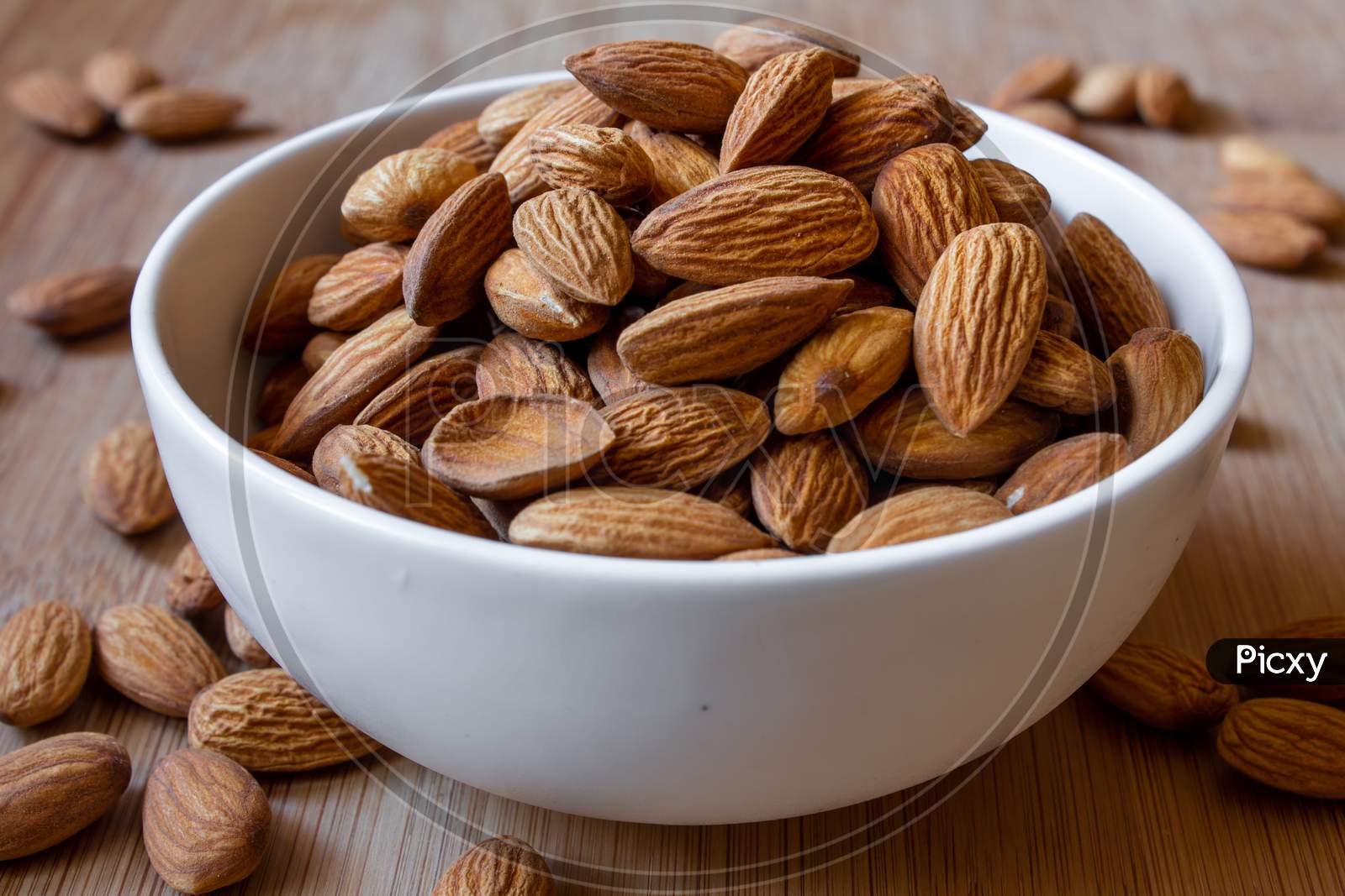 View Of Almonds In A Bowl. Use For Healthy Snack Concept.
