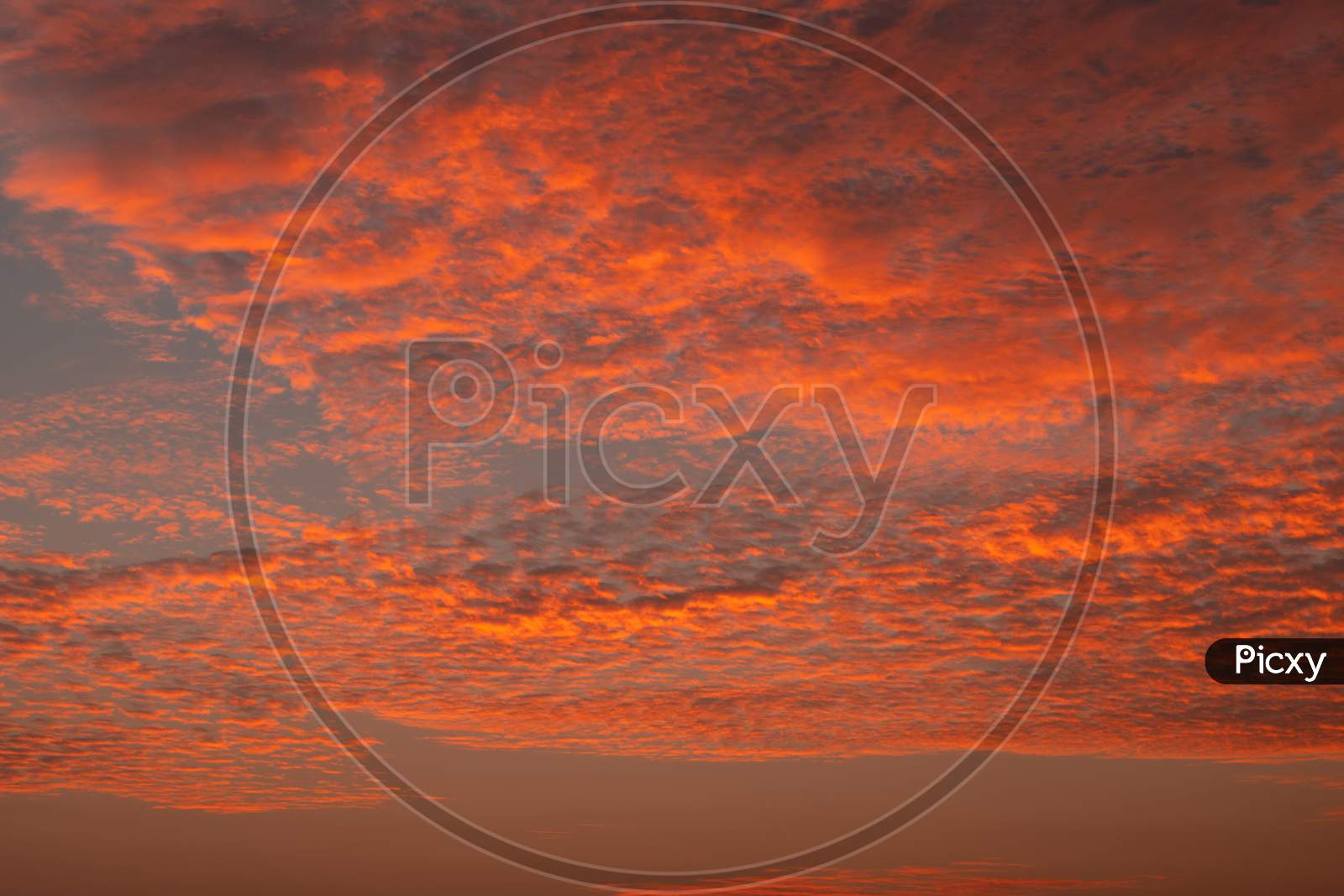 Golden Hour Sunset Dramatic Cloudscape Photograph, Showing Off Nature'S Beauty.