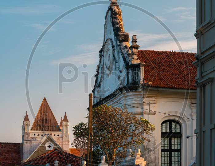 All Saint'S Church In Galle Dutch Fort Side View In The Evening Light Hitting On The Roof Top And Lighten Behind The Church Walls.