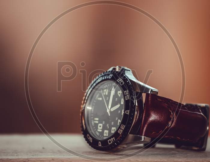 View Of A Beautiful Wrist Watch Against Simple Background