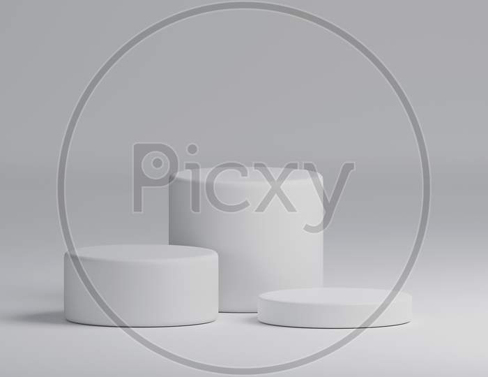 Three White Cylinder Product Stage Podium Background. Minimal Fashion Theme. Geometry Concept. Exhibition And Business Marketing Presentation Stage. 3D Illustration Rendering Graphic Design