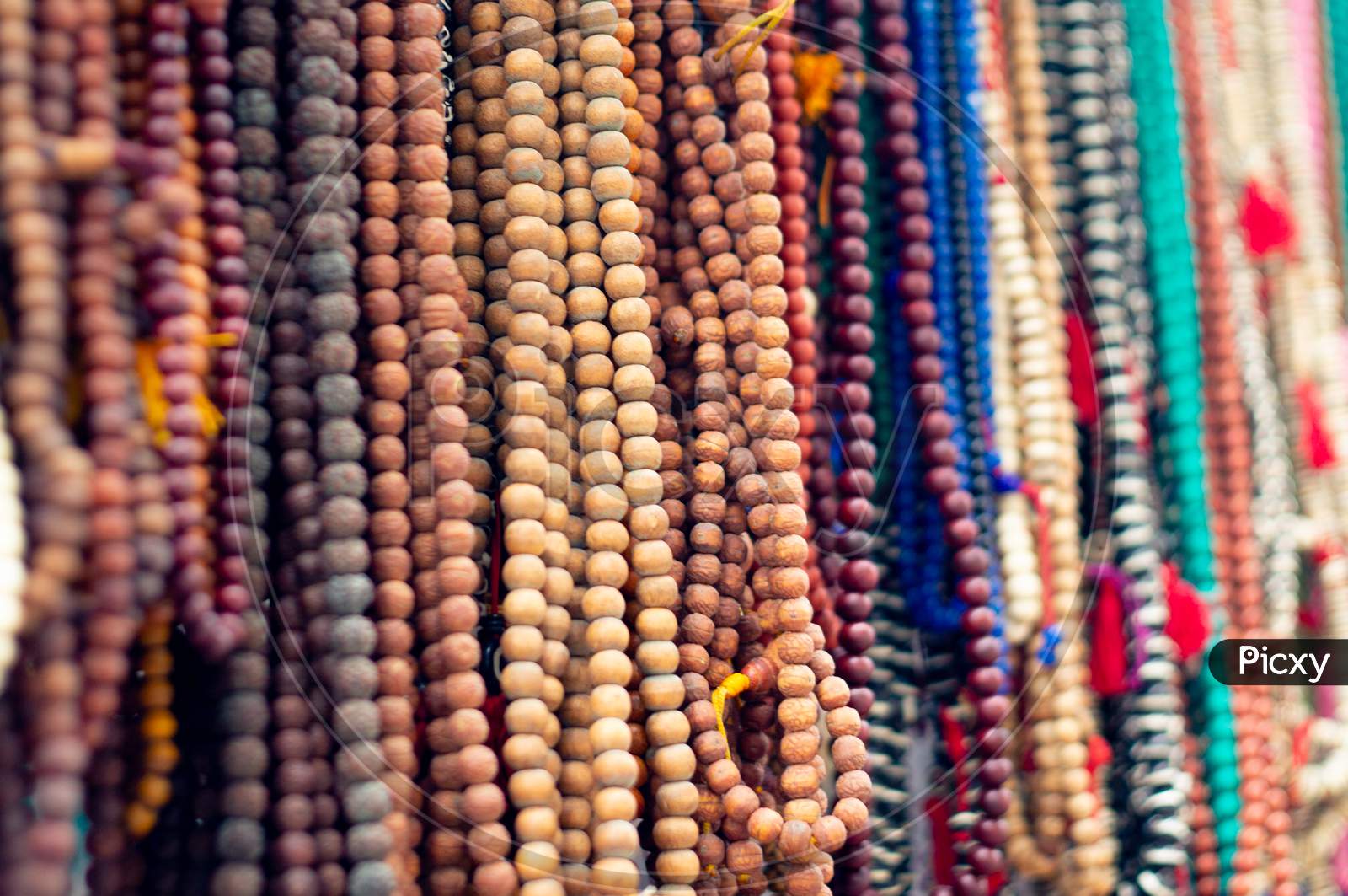 Wooden Prayer Worry Beads On String Used As A Way To Reduce Stress And Relax Sold In An Open Shop As A Tourist Attraction Near Hinduism Buddhism Temple