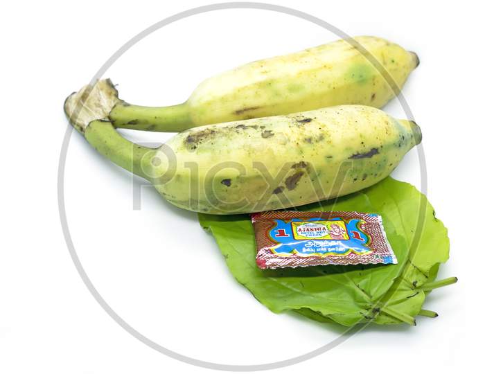 Chennai, India - December 29, 2020: South Indian Prayer Items Bananas With Green Betel Leaf And Pakku Isolated On White Background