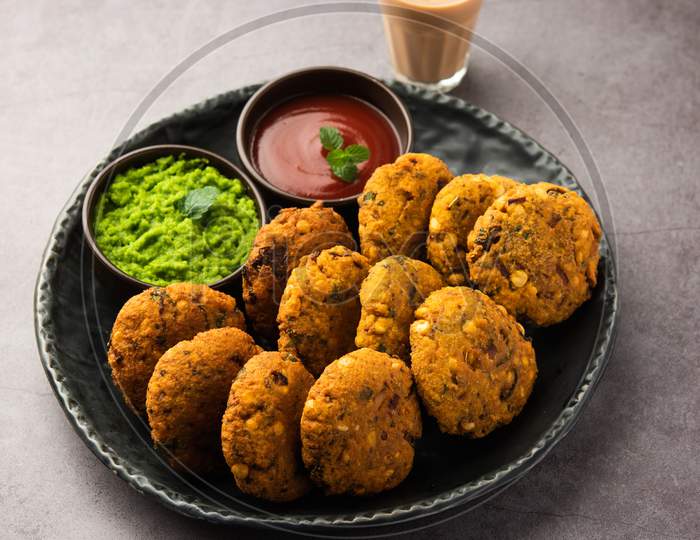 Parippu Or Paruppu Vadai Or Masala Chana Dal Vada Served In A Plate With Ketchup