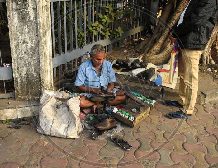 A cobbler on the street,