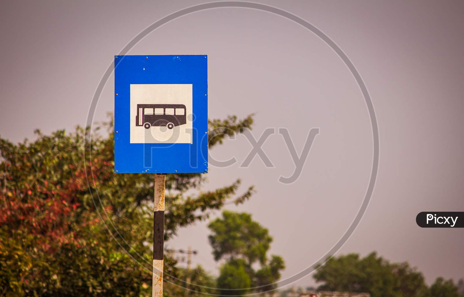 Informatory Sign Denoting Bus Top Ahead For Passengers To Board Along The Roadside