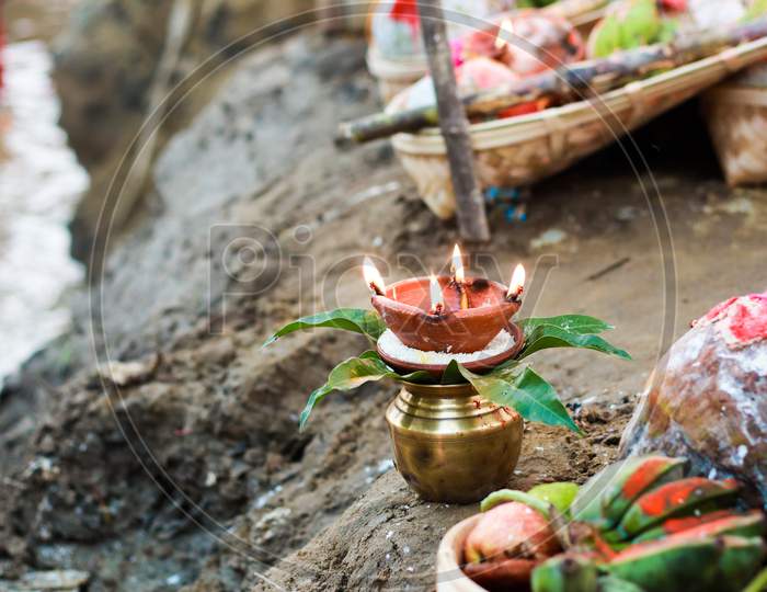 Holy Offerings Of Fruits Flowers Lamps And Cloths In River To Sun God On The Occasion Of Chhath Puja Or Chatt Puja
