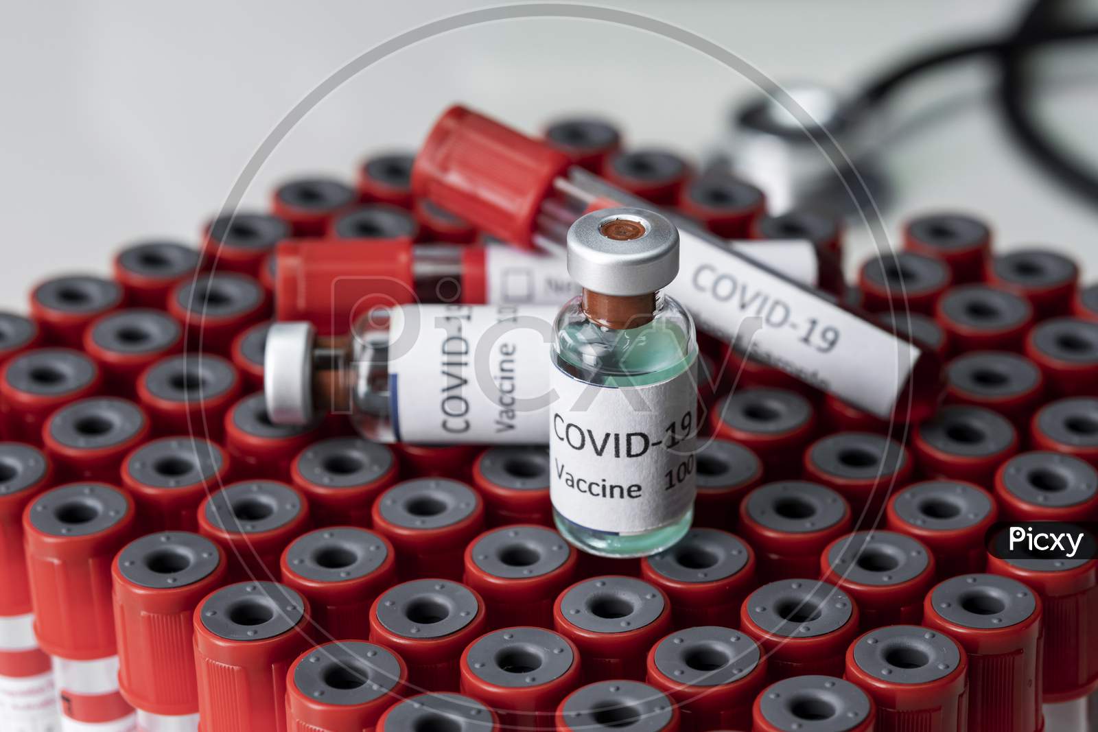 Nobel Coronavirus Covid-19 Vaccine Vial A Illustrative Picture, Doctor In The Laboratory With A Biological Tube For Analysis And Sampling Of Covid-19 Infectious Disea.