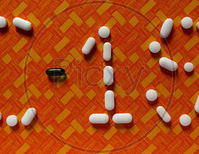 Covid-19 Shaped Medical Pills Isolated On A White Background