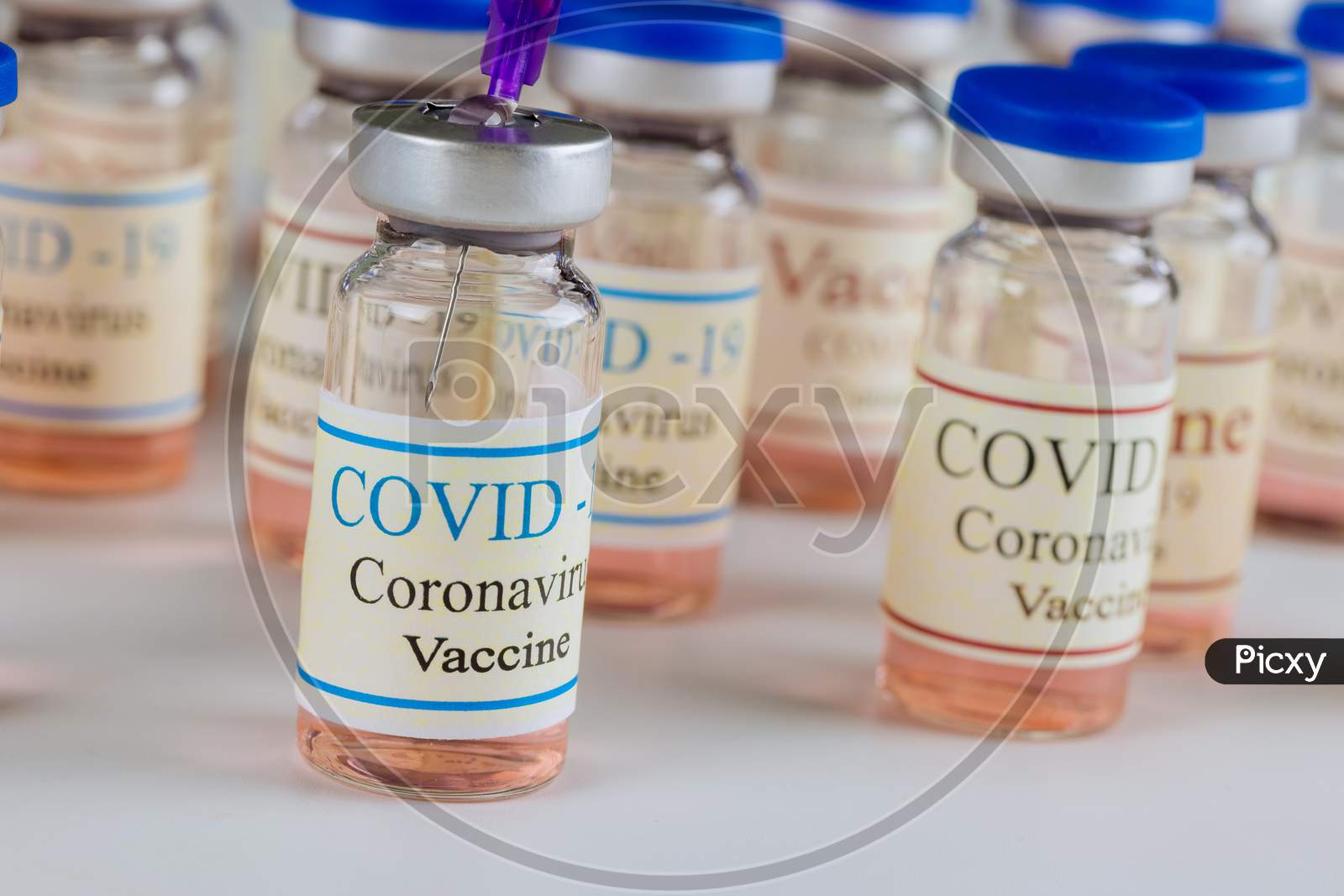 Covid-19 Coronavirus Vaccine Glass Vials With Vaccination Against 2019-Ncov Virus.
