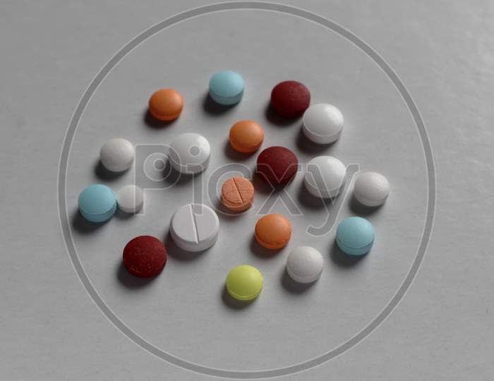 Colorful Medical Pills Isolated On A White Background