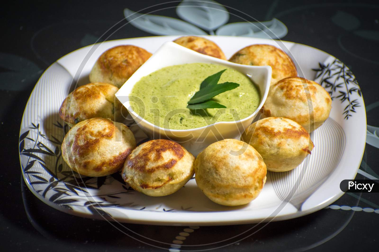 Indian Home Made Recipe 'Appe' with Green Chatni. Specialty Of South Indian Food