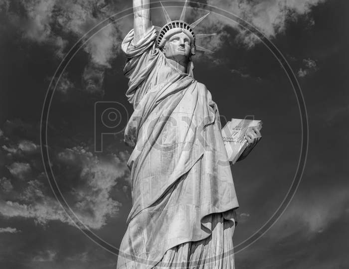 The Statue of Liberty in New York City USA daylight close up low angle view in black and white
