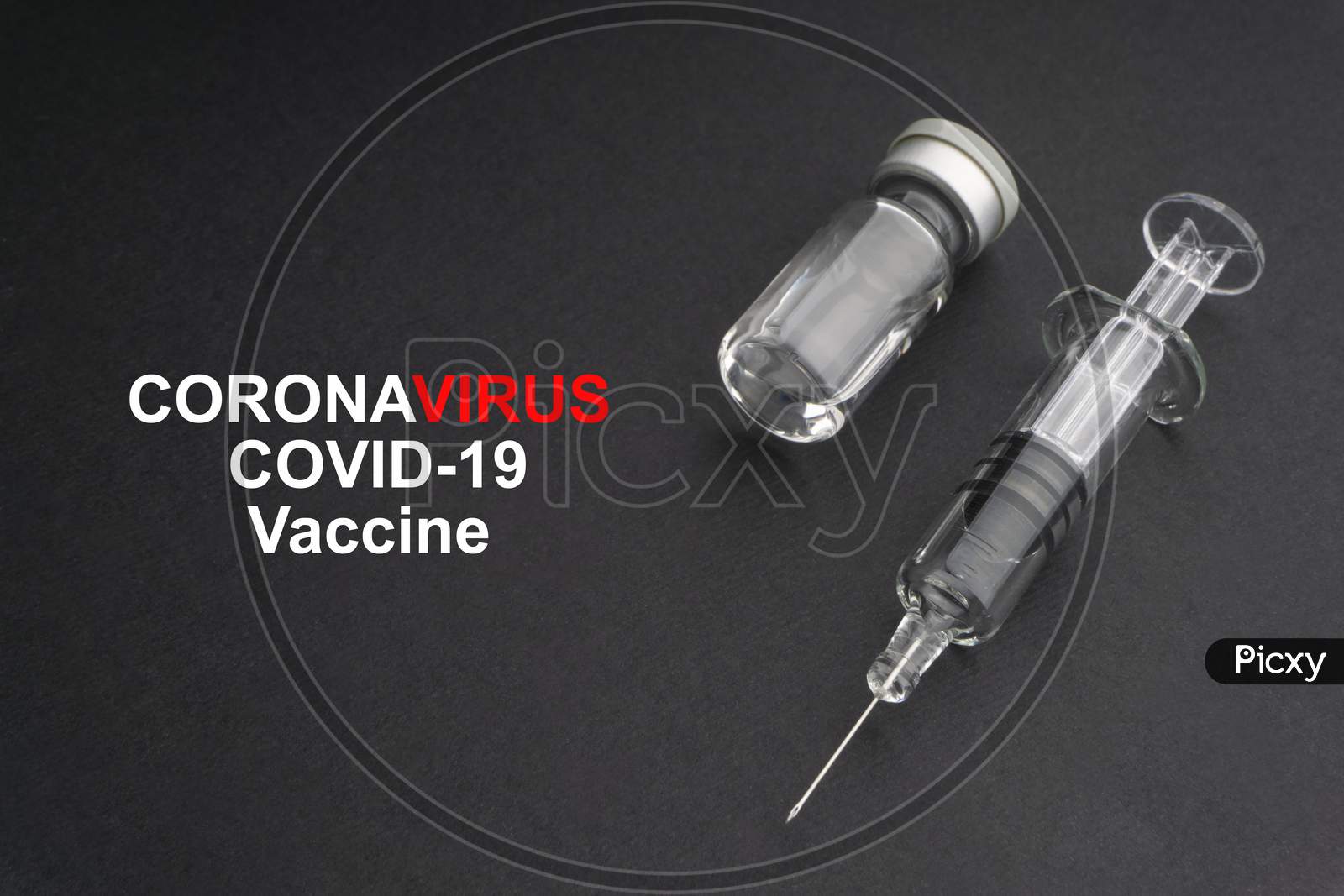 Coronavirus Covid-19 Vaccine Text With Syringe And Vials On Black Background