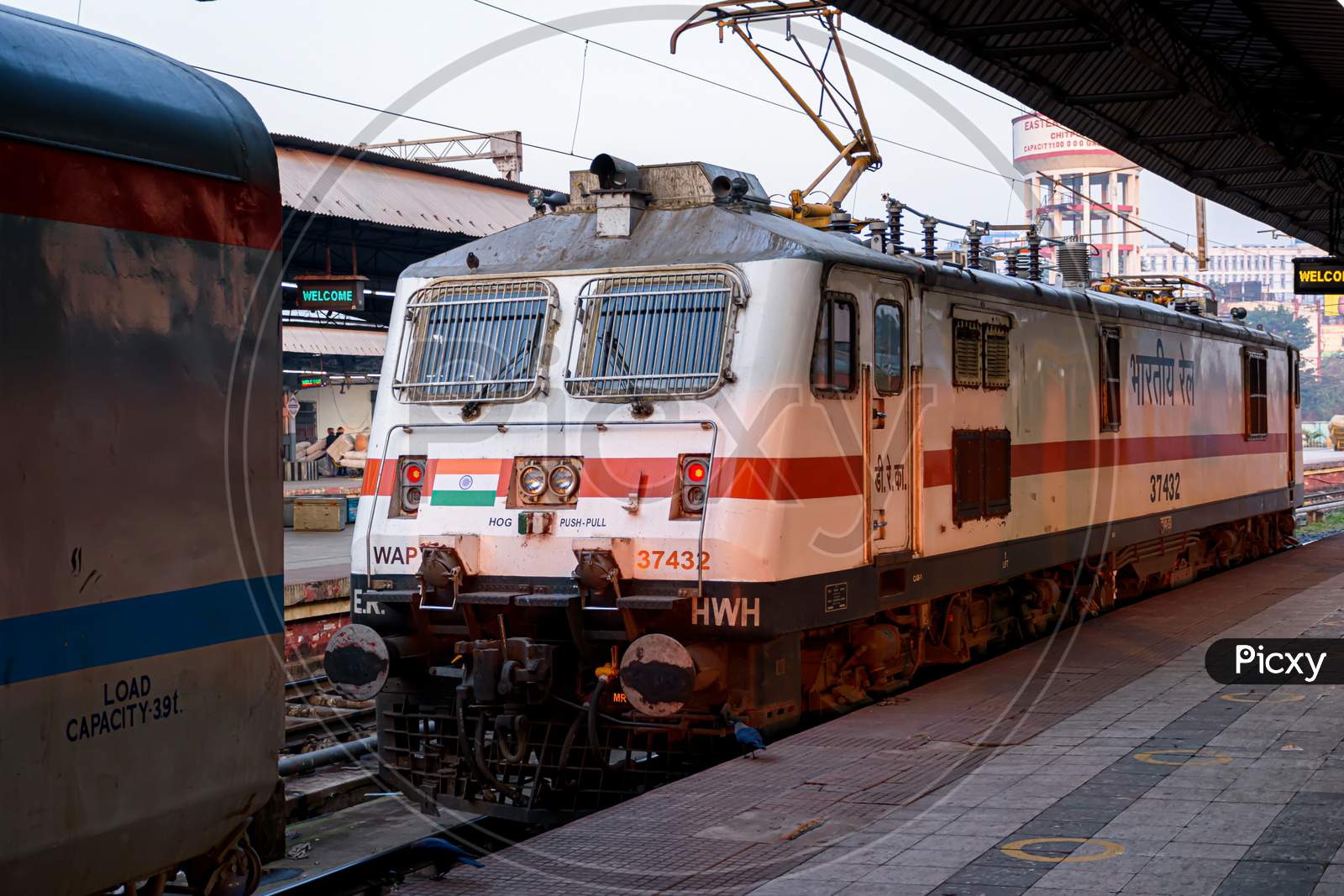 Picture Of A Locomotive Engine Is Wating For Connecting With A Passenger Train At A Junction Railway Station Of Indian Railways System. Kolkata, India On February 2021