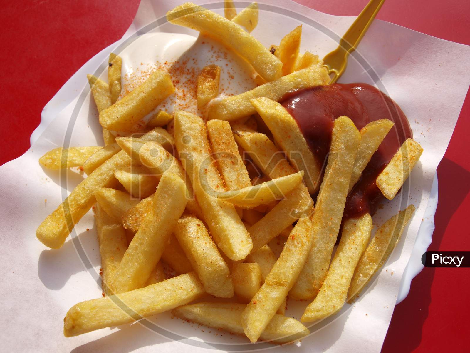 Tasty French Fries with red Sauce