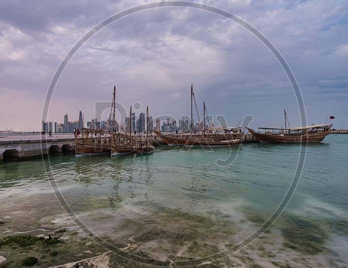 Doha skyline from the corniche promenade afternoon wide angle shot