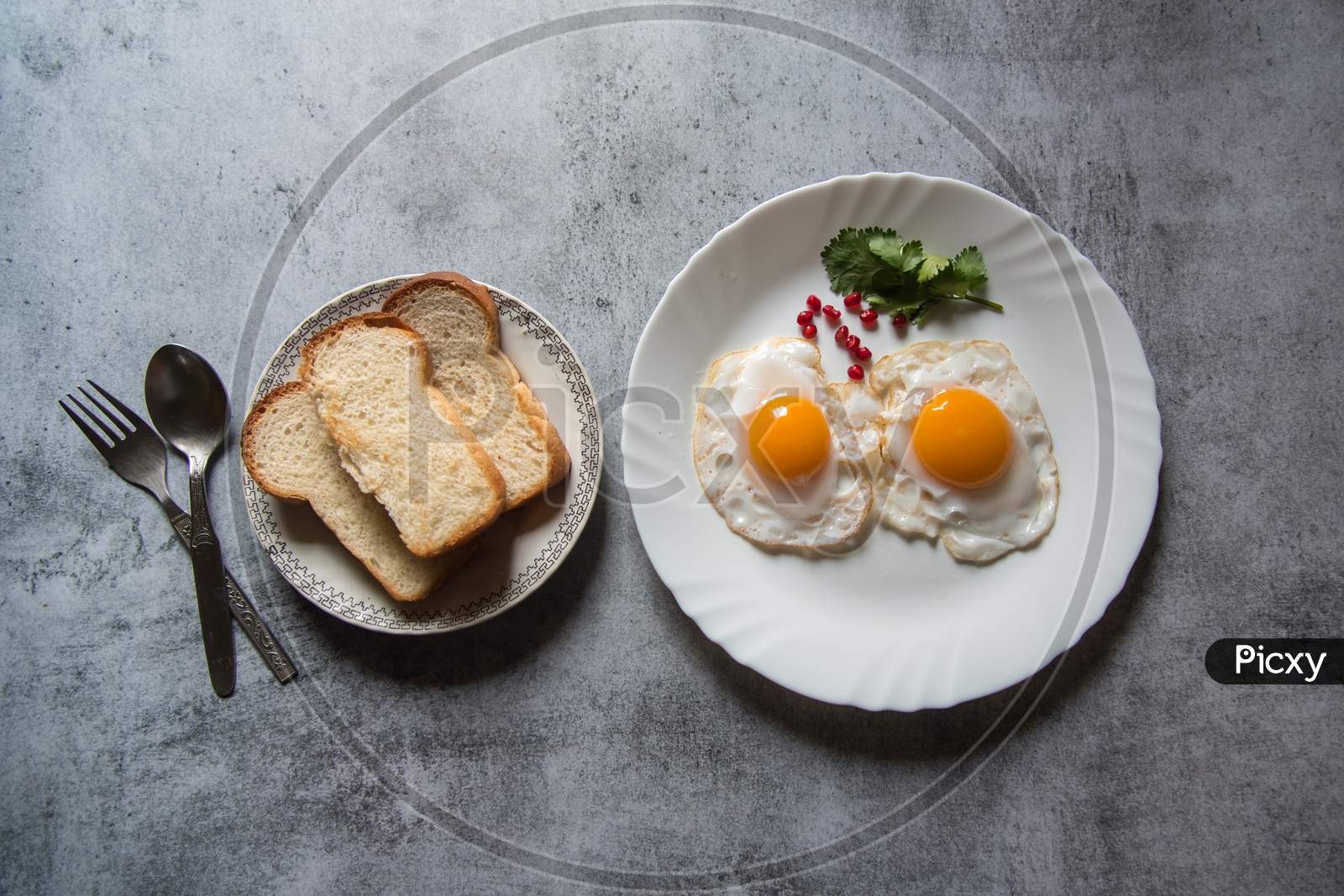 Bread slices and egg poaches are a popular breakfast ingredient.