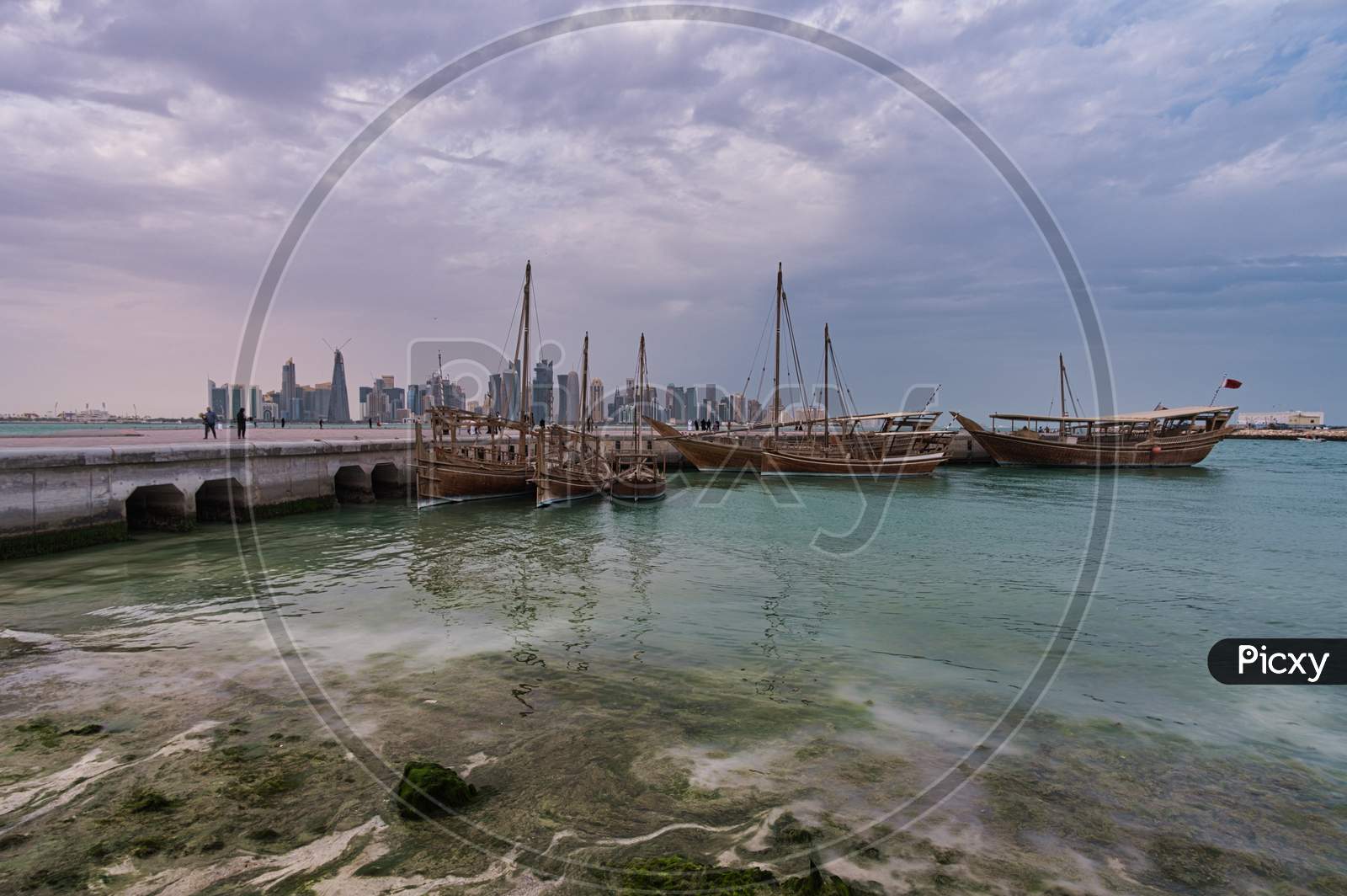 Doha skyline from the corniche promenade afternoon wide angle shot
