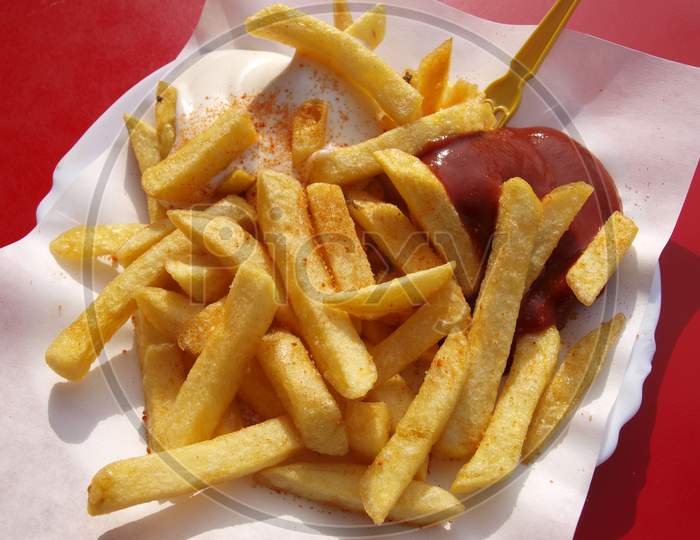 Tasty French Fries with red Sauce