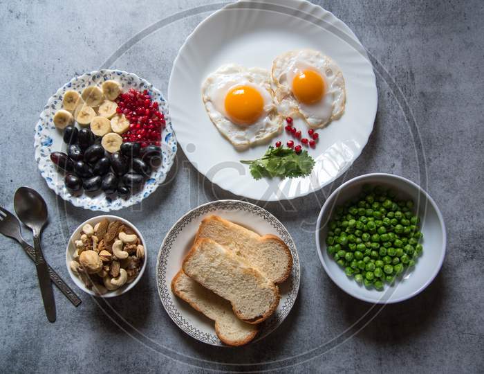 Healthy breakfast food ingredients on a background.
